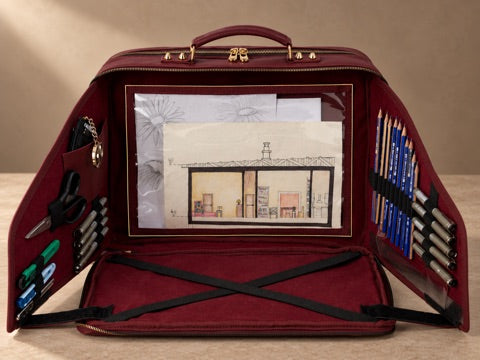 Transparent document pocket holding sketches inside the open VeloraWork bag